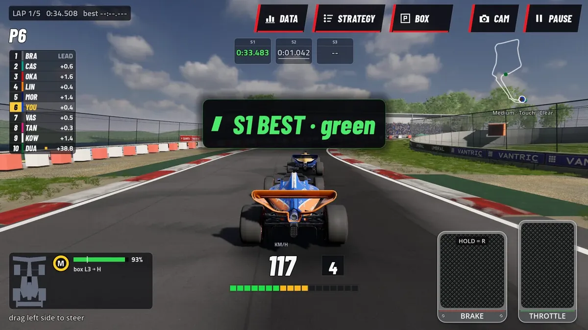 Chase camera behind the car with a green sector-best timing card on screen